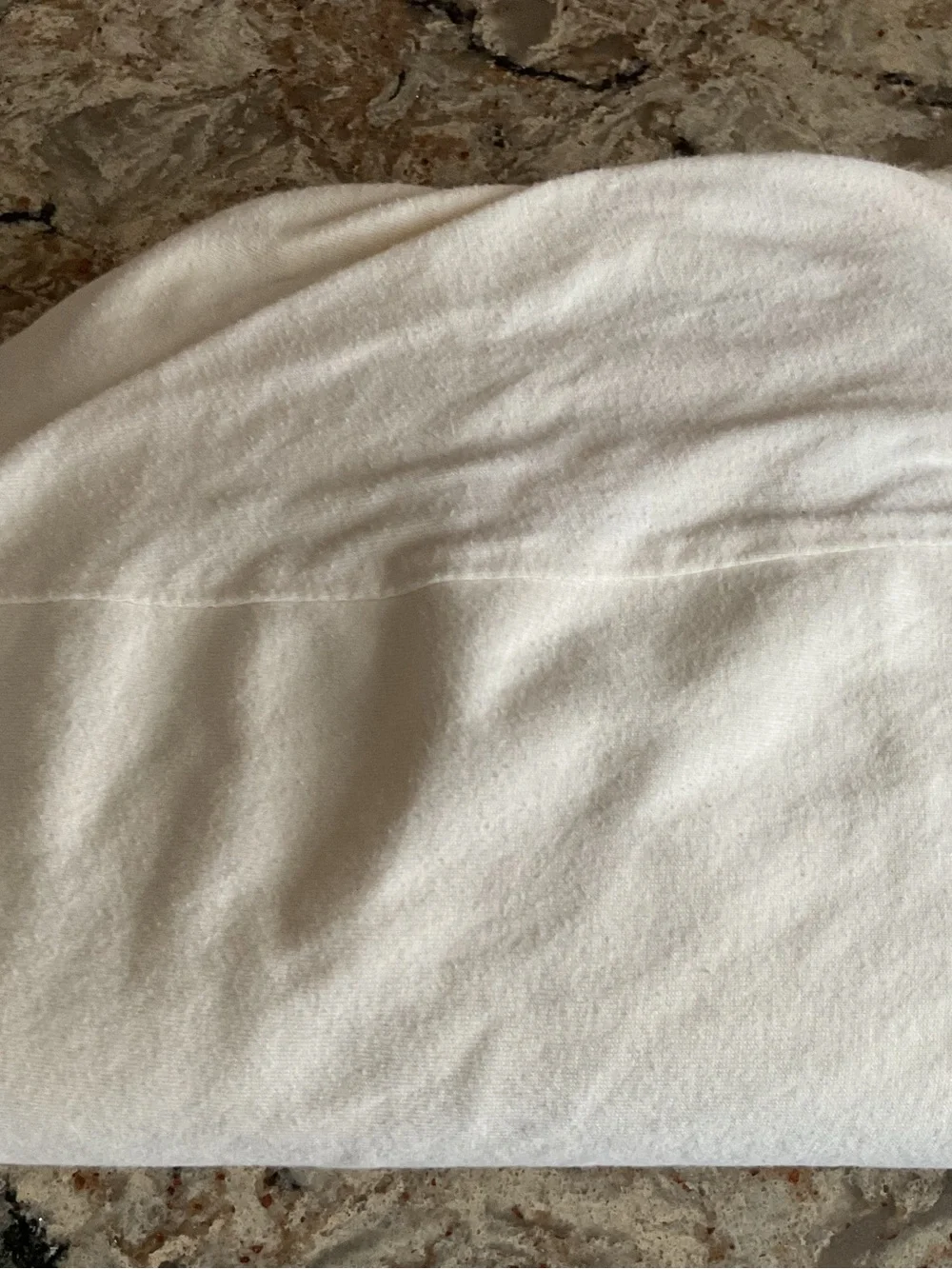 Organic cotton waterproof crib mattress protector by Naturepedic